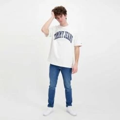TOMMY JEANS T-SHIRT TOMMY COLLEGIATE Bianco -Tendenza Italia tommy jeans dm0dm12856 t shirt tommy collegiate casual uomo 045110401 ybr 5