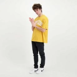 TOMMY JEANS T-SHIRT TOMMY COLLEGIATE Giallo -Tendenza Italia tommy jeans dm0dm12856 t shirt tommy collegiate casual uomo 045110501 zfw 5